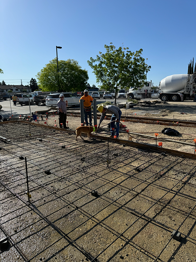 Large commercial concrete foundation slab with rebar installation for a warehouse facility