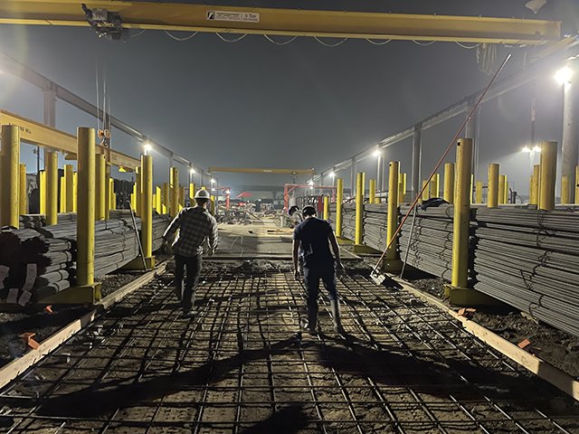 Structural concrete columns and beam formwork under construction at a commercial facility